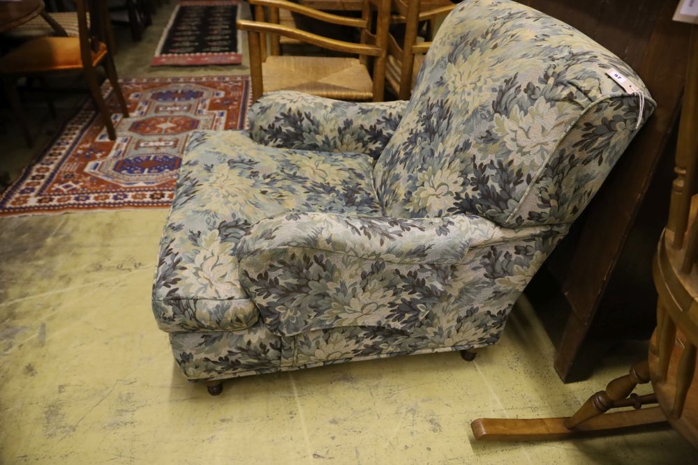 A Howard style upholstered armchair, width 90cm, depth 108cm, height 86cm